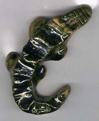 The Crocodile (clay 
covered with glaze) 